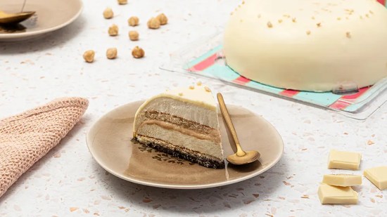 porcion-nueva-tarta-crema-avellana-blanca_